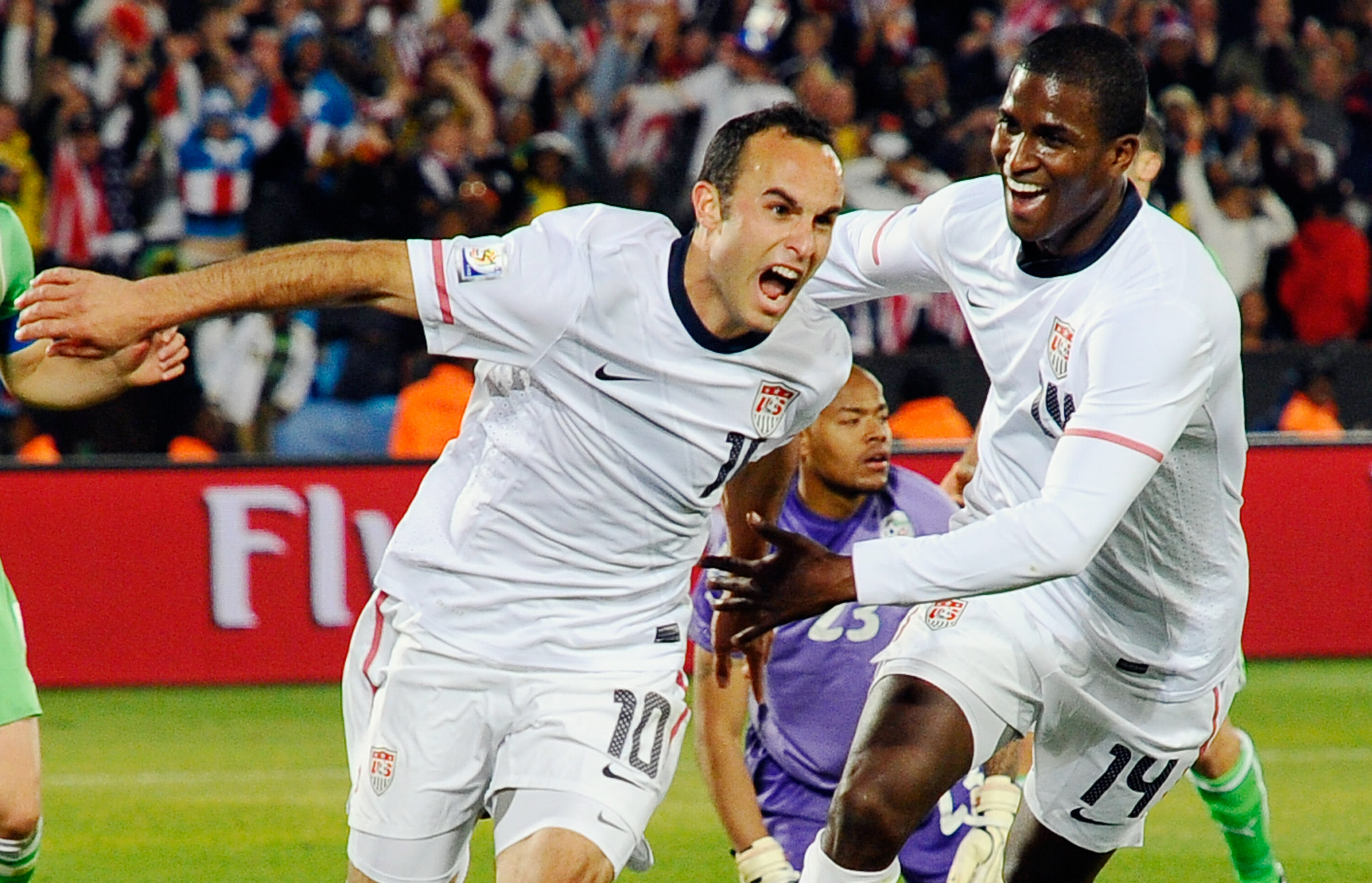 PRETORIA, SOUTH AFRICA - JUNE 23:  Landon Donovan of the United States celebrates with teammate Edson Buddle after scoring the winning goal that sends the USA through to the second round during the 2010 FIFA World Cup South Africa Group C match between USA and Algeria at the Loftus Versfeld Stadium on June 23, 2010 in Tshwane/Pretoria, South Africa. (Photo by Kevork Djansezian/Getty Images)