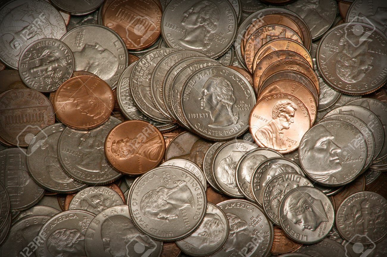 2175684-American-coins-pennies-nickels-dimes-and-quarters--Stock-Photo